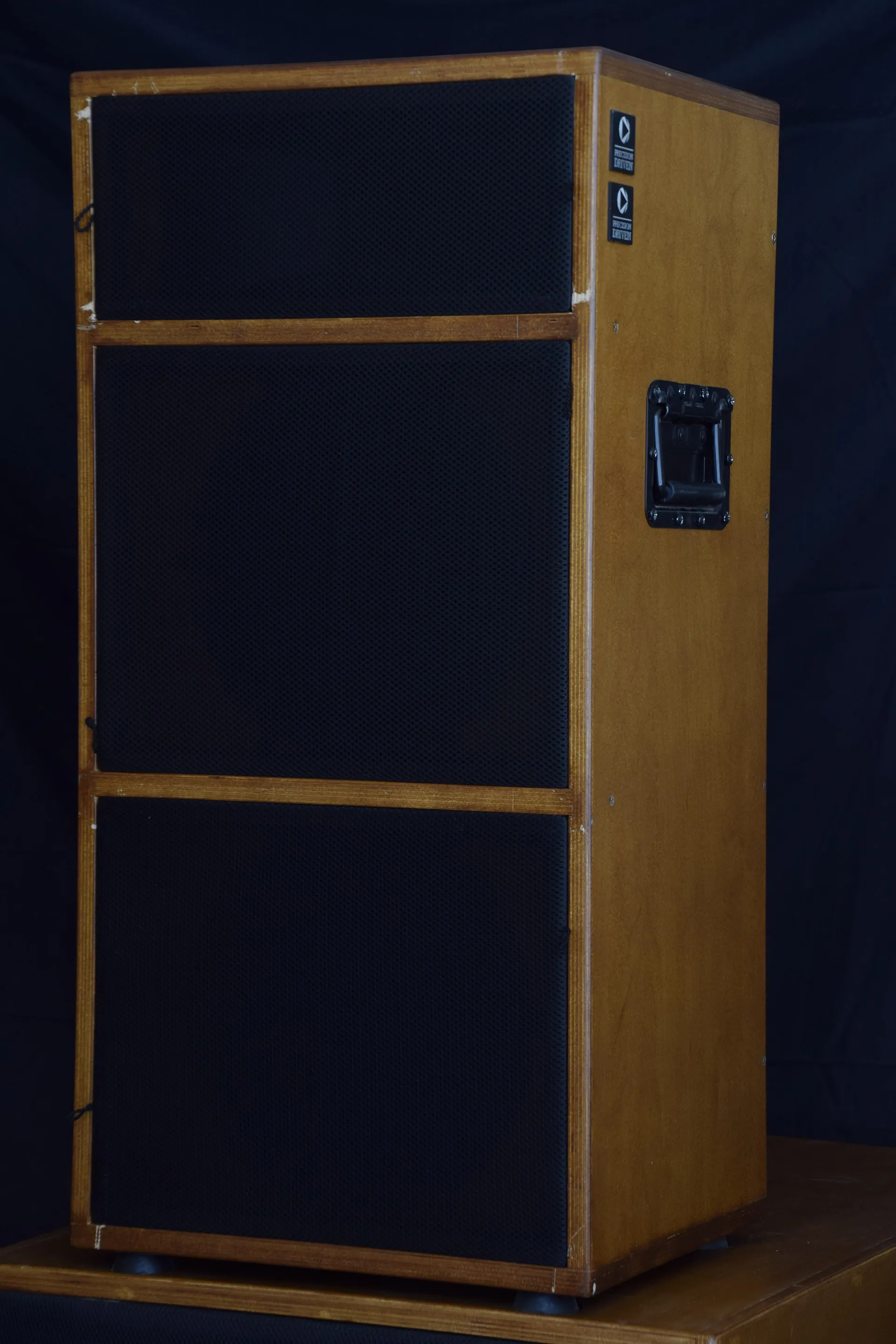 A full-range cabinet with its grille on