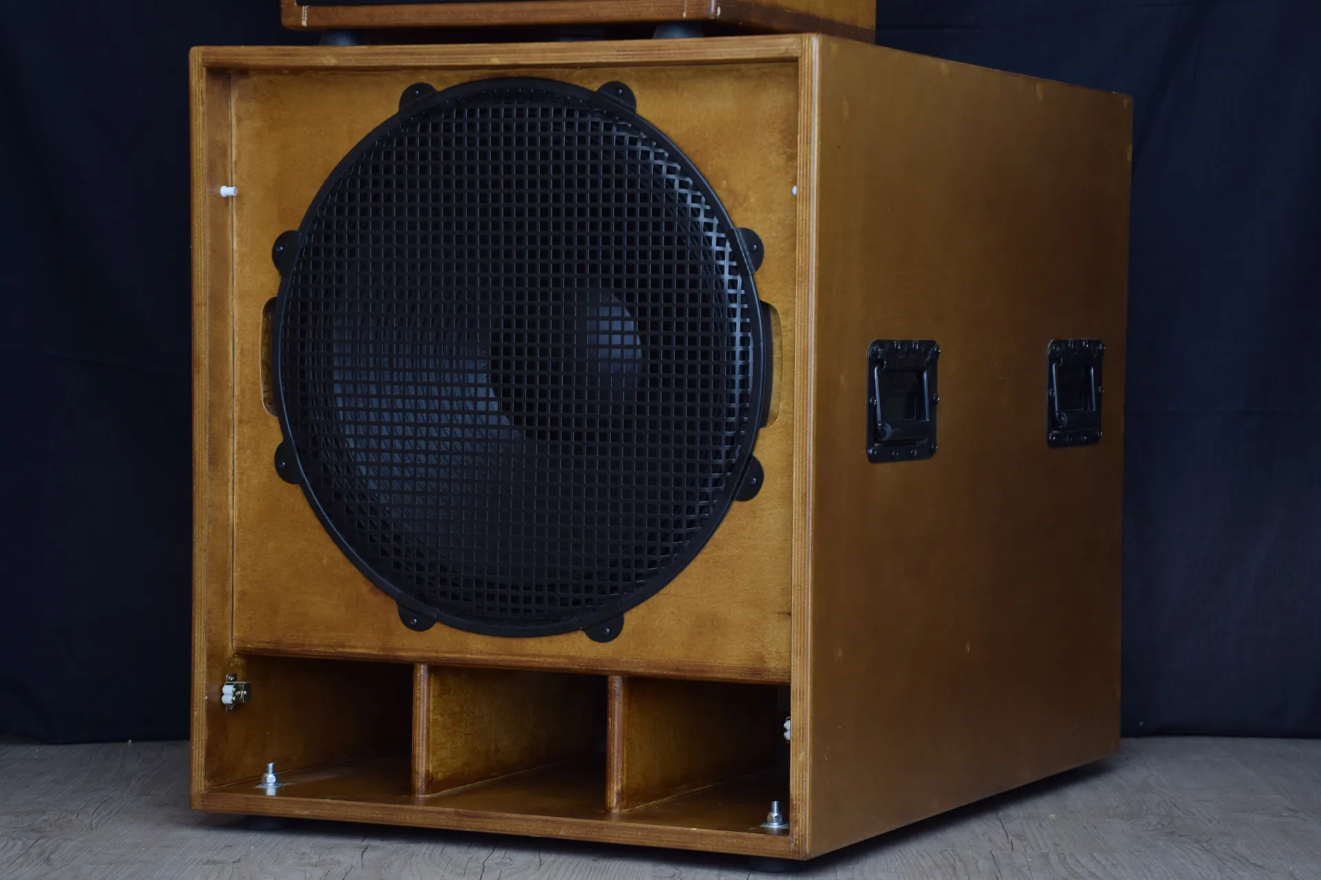 The subwoofer without its grille
